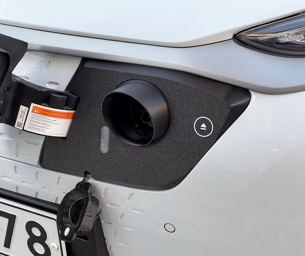 Snødeksel til ladeport på Hyundai Kona Electric 2019–2020 – original karosserigenerasjon