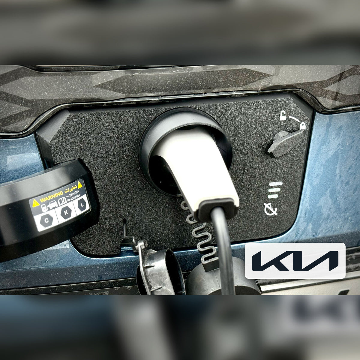 Snødeksel til ladeport montert på Kia Niro EV