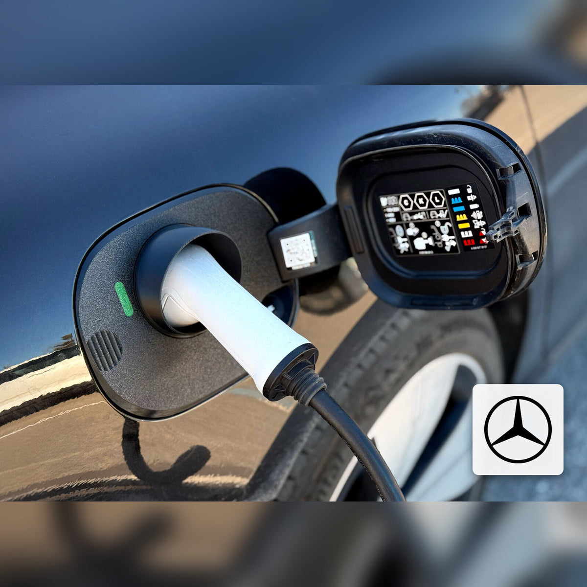 Snødeksel til ladeport montert på Mercedes-Benz EQS Sedan